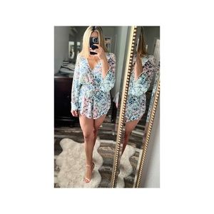 Long sleeve short romper.